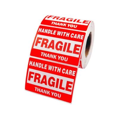 China Custom Markedness Adhesive Handle with Care Shipping Label Transportation Fragile Warning Packing Stickers for sale