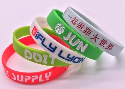 China Hand Strap Luminous Silicone bracelet Recessed wrist Rubber strap custom OEM logo words color size wrist for sale