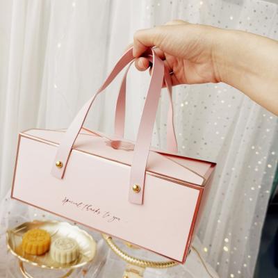 China Fashionable Gift Decoration New Year Birthday Party Paper Box Portable Leather Chocolate Candy Packaging for sale