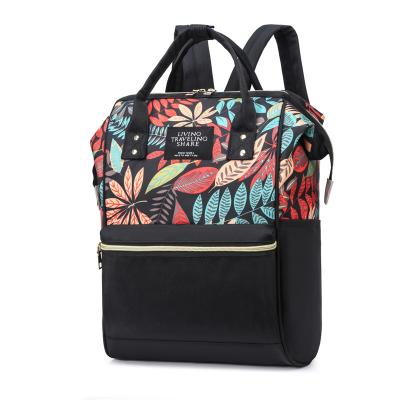 China Hot Selling Water Resistant Maple Leaf Printed Waterproof Mummy Bag Travel Nappy Diaper Backpack For Baby Care for sale