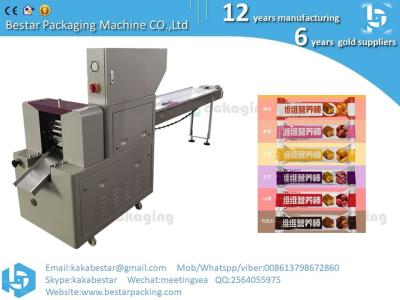 China Quality Assurance Vertical Flow Packing Biscuit Cookie Candy Cheese Energy Chocolate Protein Granola Bar Packaging Machi for sale