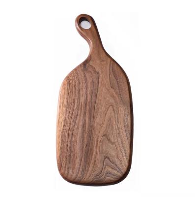 China Sustainable Wood Chopper Household Black Walnut Bread Board Sushi Platter Gourmet Fruit Cutting Board for sale