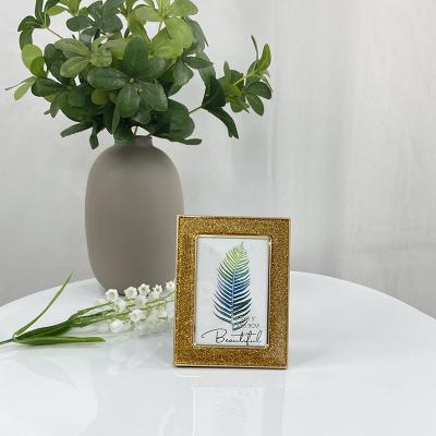 China Custom Made Premium Creative Luxury Ornament Stereo Glass-metal Geometric Mini Photo Frame Eco-friendly Sustainable Decoration for sale