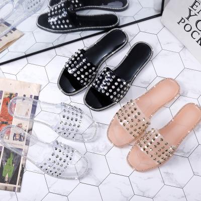 China Fashion Trend New Arrival Ladies Freeze Flip Flops Indoor Shoes Beach Outdoor Slides For Girls Summer Rivet Women PVC Slippers for sale