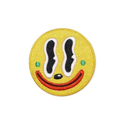 China Plain Embroidery New Type Stocked Customized Designer Clothing Patches Smiling Face Embroidery for sale