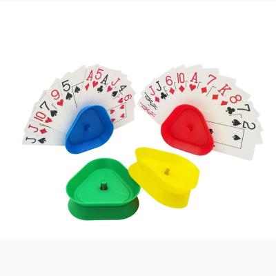 China Plastic Set Of 4 Casino Accessories Poker Game Riangle Shaped Hands Free Card Holder for sale