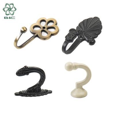 China New Design Eco-friendly Wall Hanging Hangs Decorative Curtain Tieback Wrought Iron Wall Crystal Hook Curtain Tieback for sale