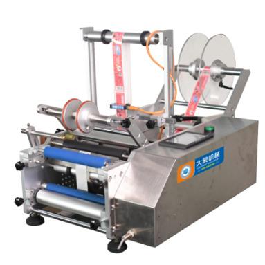 China Easy Operation Simple Manual Labeling Machine Round Bottle Adhesive Sticker With Handle Labeling Machine Wine Bottle Small Labeling Machine for sale