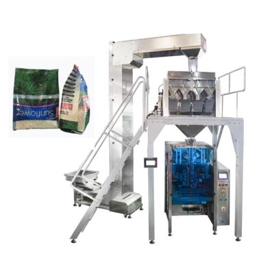 China Easy Operation 1kg - 5kg Full Automatic Plastic Bag Granule Particle Food Rice Packing Machine Price for sale