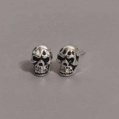 China High quality hot cool cool 925 sterling silver skull hole earrings 925 jewelry sale hiphop fashion gift punk skull earrings for sale