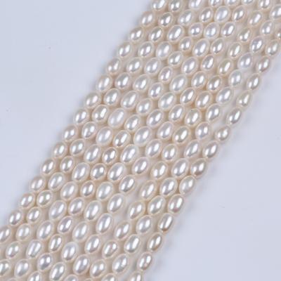 China Jewelry 9mm White Rice Shape Real Loose Freshwater Rice Pearl Bead Strand for sale