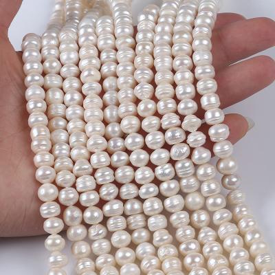 China Jewelry 9-10mm White Button Shape Real Freshwater Pearl Loose Bead Strand for sale