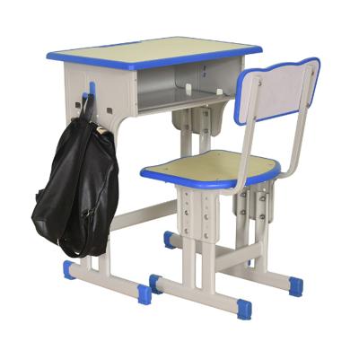 China Modern Steel Blue Adjustable Student Height Simple School Furniture Classroom Desks And Chairs for sale