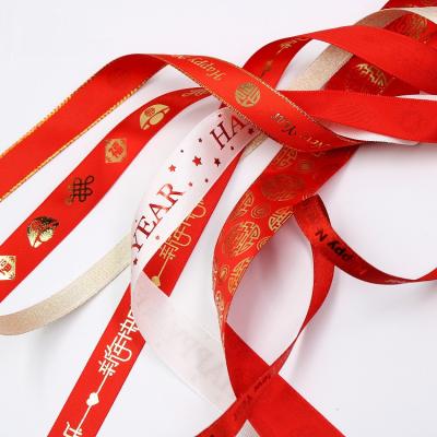 China New Year Spring Festival Supplies Wholesale Red Ribbon Holiday Decoration Gift Ribbon Viable Wrapping Printing Ribbon Chinese for sale