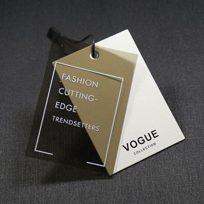 China Recyled PVC Customized Special Trademark Clothing Tagger Paper Material Hang Tag For Garment for sale