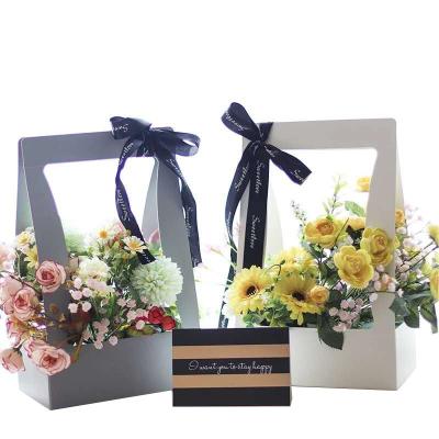 China Recycled Materials AIER Wedding Gift Flower Packing Paper Foldable Waterproof Paper Carrier Foldable Bouquet Bag for sale