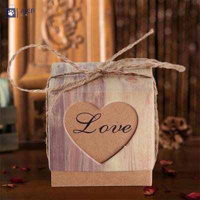 China Recycled Materials Wood Grain Hollow Kraft Paper Gift Box Love Heart Shaped Folding Gift Box for sale