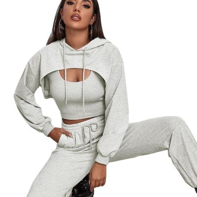 China Anti-Wrinkle Leisure Fashion Sports Three Piece Set Sportswear Tight Fit Vest Long Sleeve Jogging Loose Hooded Coat Semi Long for sale