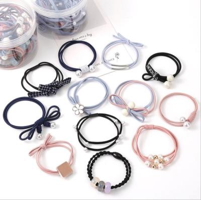 China 12PCS/bag Fashion Pearl Hair Ties For Women Girls Elastic Flower Ponytail Hair Bands Headband Hair Accessory Set With Net Bag for sale