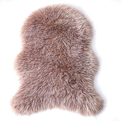 China Modern Soft Fur Artificial Sheepskin Blankets Carpet For Bedroom Living Room Skin Fur Rug Plain Seat Fluffy Pad Washable Faux Carpet for sale