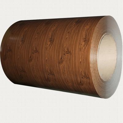 China Design corrugated wood color grain roof ppgi coated steel sheet in coil for building material for sale