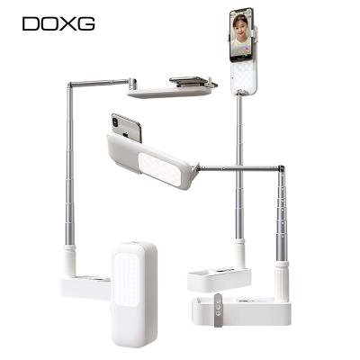 China Doxg V6 Live Show Stand Right Fill Wireless Remote Control Light Adjustable Internal Foldable Phone Holder Battery for Photography Live Strea for sale