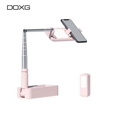 China Doxg V6 Mini Stick Tripod Action Movie Selfie Light Stand Desk Mobile Phone Ring Light for sale