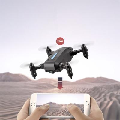 China Pro small mini M9 mode headless drone for kids pass band gyro headless mode 6 360 degree rotation folding rc drone for sale