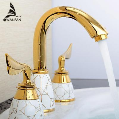 China Modern Gold Finish 618 Mixer Tap Bathroom Faucet Basin Faucet Deck Mounted Sink Faucet Set Luxury 3 Piece Set Faucet Basin for sale