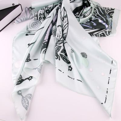 China Muslim Hijab Soft Feeling Soft Feeling Scarf Girls Head Wrap Shawl Matte Satin Print Square Floral Tudung Premium Islamic Bawal Patterns for sale