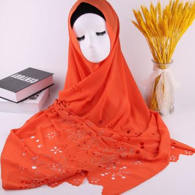 China New 60 Colors Solid Color Shawl Soft And Comfortable Warm Drilling Hijab Maxi Design Hollow Muslim Ladies Scarf for sale