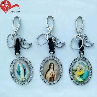 China Alloy Catholic Religious Glass Oval Lace Key Chain for sale