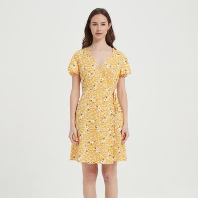 China Hot Sale Ladies Summer Floral Dress Anti-static Elegant Yellow Casual Short Sleeve V-Neckline Printed Skirt for sale