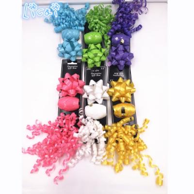 China Eco-friendly Christmas Decoration SPC Star Bow Bow And Ribbon Eggs Material Pretty Curly Set for sale