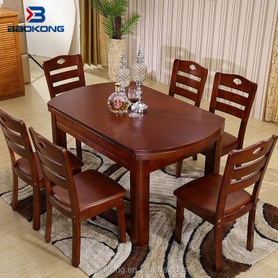 China New Design Collapsible Compact Dark Walnut Rubber Wood Dining Table Extendable Folding Set for sale