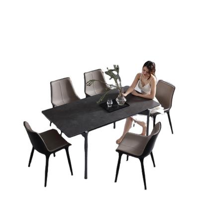 China Modern Italian Style Dining Room Furniture ABS Base Luxury Genuine Leather Dining Chair (Height) Adjustable for sale