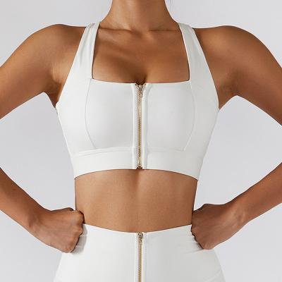 China Supplier Breathable Hot Selling Sexy Gym Women Running Workout Fitness Yoga Training Crop Tops Front Zipper Crossed Back Yoga Sports Bra for sale