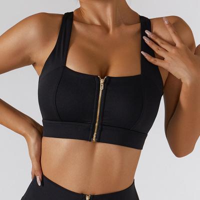 China Wholesale Breathable Women Sexy Gym Workout Fitness Yoga Running Training Crop Tops Front Zipper Crossed Back Yoga Sports Bra for sale