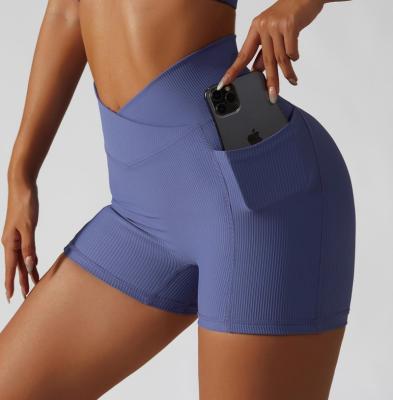 China Hot Selling Solid Color Girl's Breathable Stretch Rib Fabric High Waist Gym Pants Women Butt Lift Sports Shorts Yoga Shorts With Pockets for sale