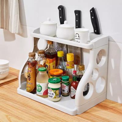 China 2 Tier Sustainable Storage Rack Plastic Multilayer Kitchen Seasoning Rack Bottle Storage Racks for sale