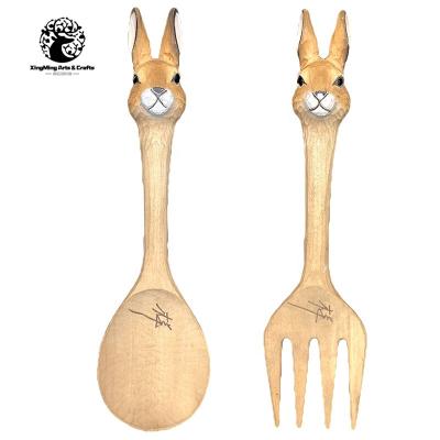 China Europe And America Hand Carved Wooden Salad Server 3D Rabbit Handle Forks And Spoons Maker for sale