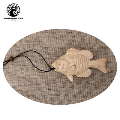 China Europe ready to ship hand carving wooden decorations to fish shape primitive wood hangings color for sale