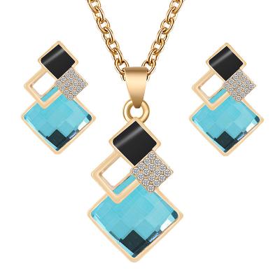 China CLASSIC Block Alloy Necklace Earrings Crystal Glass Inlaid Pendant Gold Plated Jewelry Sets Women's Fashion Jewelry for sale