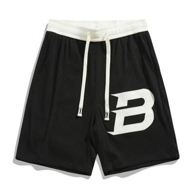 China QUICK DRY custom logo color casual black white summer shorts high quality mens sports shorts basketball shorts for sale