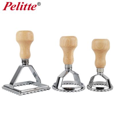 China Disposable Zinc Alloy Ravioli Stamp Set Cookie Press Sets Dought Cutter With Wooden Handle for sale