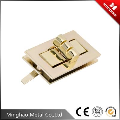 China Promotion gold handbag square turn lock for bag fittings,43.8*24.18mm,light gold for sale