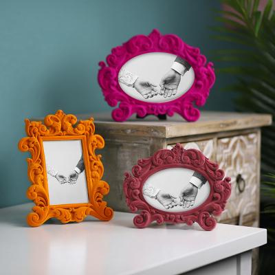 China European Modern Redeco Personalized Princess Style Home Decoration Resin Opens Resin Photo Frame for sale