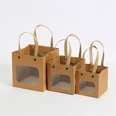 China Factory Hot Selling Handmade Packaging Paper Bag Portable Color Printing Take Away Kraft Paper Flower Bag With Handle for sale