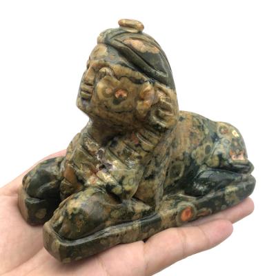 China Handcrafted animal rhyolite Crystal Carvings from natural rainforest sphinx from Europe for sale