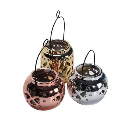 China Factory direct ceramic jar candle holders ceramic plated ceramic candle jar candle lantern with lantern style for sale